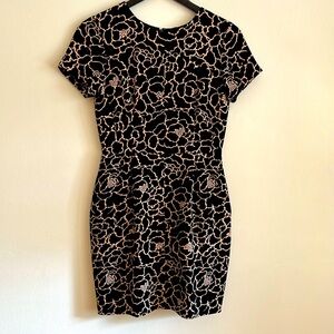 Beautiful dress in black/tam floral print. Club Monaco.